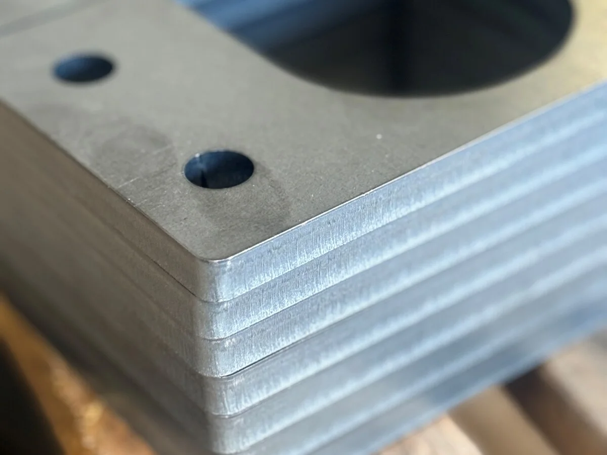 Stack of laser cut plates, edges as cut